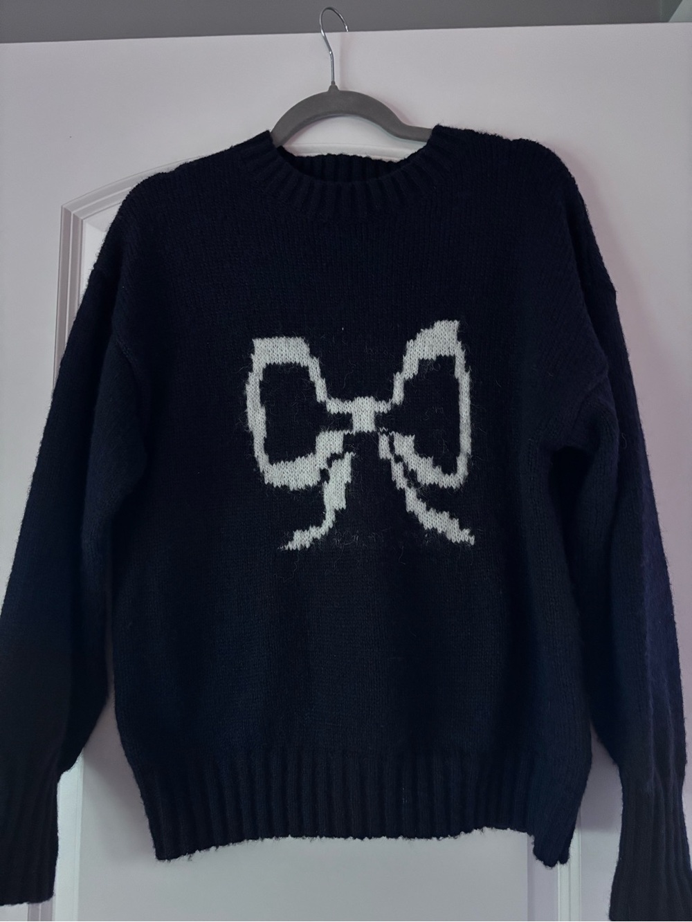 Black Crewneck Sweater with White Bow Motif